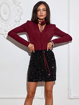 Short skirt Roco Fashion  This shiny mini skirt attracts attention with its elegant shine and precise execution, which emphasizes its high quality and Polish producti