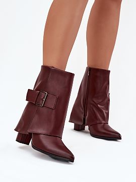 Heeled boots Step in style  Fashionable ankle boots with a folded shaft are a perfect choice for the autumn-winter season. Set on a column heel, with pointed toes, they