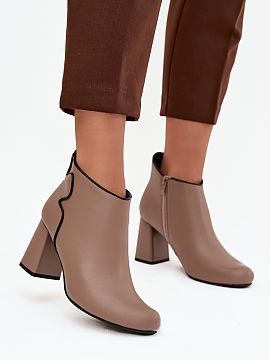 Heeled boots Step in style  Women\'s ankle boots by Jezzi are an elegant and practical proposition for cooler days. Made of natural leather, they present high quality a