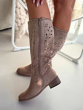 Openwork boots Step in style  Lace-up women\'s boots are a striking proposal for women who like original details. The model, set on a stable block heel, ensures comfort a