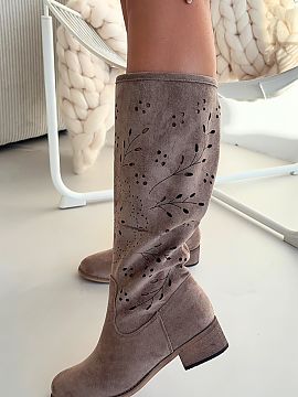 Openwork boots Step in style  Lace-up women\'s boots are a striking proposal for women who like original details. The model set on a stable block heel ensures comfort and