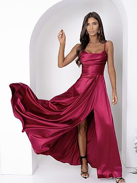 Long gown With You  The long dress with thin straps enchants with an elegant, feminine silhouette and well-thought-out details. The flowing neckline softly drap