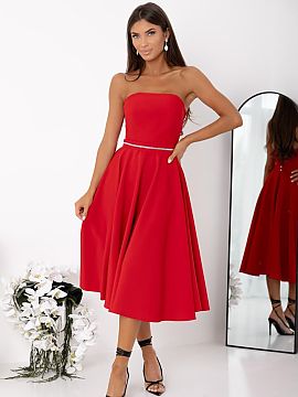 Evening dress With You  An elegant strapless dress is a proposal that combines a classic form with eye-catching details. The model is fastened with a hidden zipper 