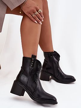 Heeled boots Step in style  Women\'s ankle boots made of eco leather are a stylish and practical proposition for cooler days. The model set on a massive heel ensures st