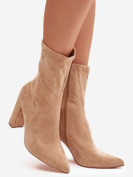 Heeled boots Step in style  Elegant women\'s ankle boots made of eco suede are a model that will complement any outfit. Set on a stable column heel, they provide comfor