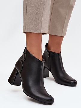 Heeled boots Step in style  Women\'s ankle boots by Jezzi are an elegant and practical proposition for colder days. Made of natural leather, they showcase high quality 