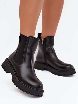 Slippers Step in style  Women\'s ankle boots from Big Star, made of natural leather, are an elegant proposition for cooler days. Set on a flat heel and platform, th