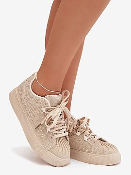 Sports footwear Step in style  Women\'s sneakers with a fashionable, eye-catching look are an ideal proposition for women who appreciate style and comfort. Decorations wit