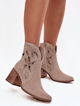 Heeled boots Step in style  Women\'s ankle boots made of natural suede are a proposal that combines elegance with a trendy accent. They stand out with an openwork finis