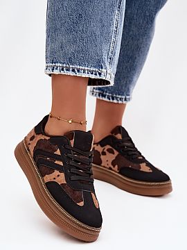 Sports footwear Step in style  Women\'s platform sneakers are a combination of modern style and comfort. The laced model, with a foam, removable insole, provides perfect f