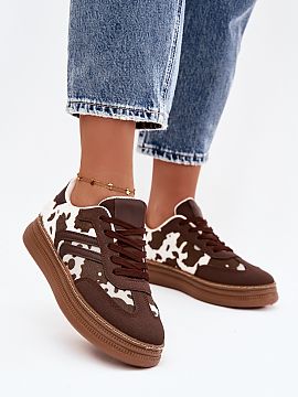 Sports footwear Step in style  Women\'s platform sneakers are a combination of modern style and comfort of wearing. The lace-up model, with a foam, removable insole, ensur