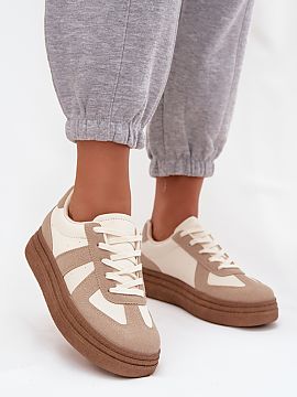 Sports footwear Step in style  These trendy sneakers are a great choice for everyday wear. Made of eco leather. Thanks to the platform, you gain additional centimeters wit