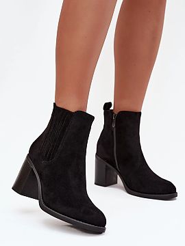 Heeled boots Step in style  Women\'s ankle boots made of eco suede are a timeless proposition for cooler days. Set on a stable pillar-type heel, they provide comfort an