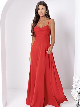 Long dress With You  Long dress made of smooth, shiny fabric. Model with detachable straps, with delicately pleated top and an eye-catching, high slit on the leg
