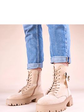 Bootie Solea  Discover the latest trend in the world of fashion - beige women\'s boots with a golden teddy bear by Messey. These unique shoes are a combin