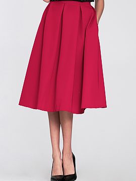 Skirt Nife  A flared midi skirt with pleats is a great choice for any occasion! The model has pockets hidden in the side seams. The skirt has a clearly 