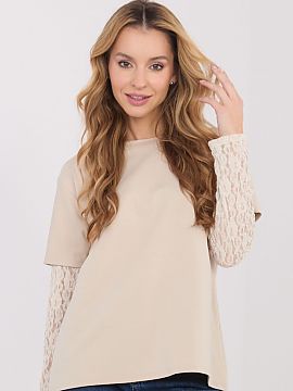 Bluzka Italy Moda  The daily women\'s blouse with a casual character combines simplicity with a delicate, feminine accent. Made of high-quality blend of cotton