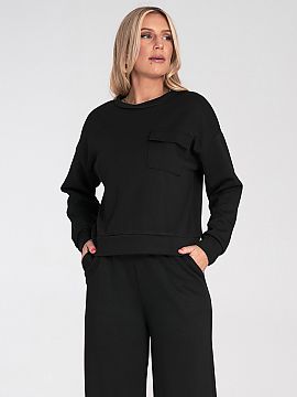 sweatshirt Figl  Women\'s blouse with a simple cut, made of soft and comfortable to wear fabric. The model has long sleeves and a classic, round neckline. Th