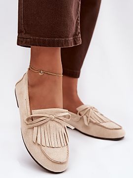 Mocassin Step in style  Flat women\'s moccasins made of eco suede are a stylish and comfortable proposition for everyday wear. At the front there are decorative fri