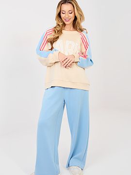 Set Italy Moda  Stylish women\'s tracksuit set consisting of a hoodie and pants, maintained in a casual style, perfect for everyday wear. It will work great