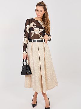 Skirt Rue Paris  This flared midi skirt is a perfect choice for women who appreciate elegance combined with comfort. The classic cut beautifully fits the sil