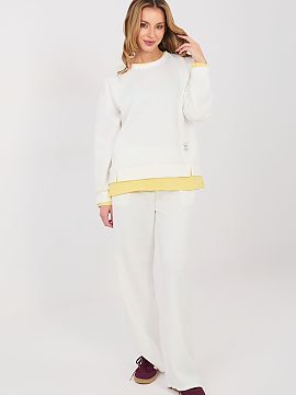 Set Rue Paris  The casual tracksuit set is a perfect choice for women who appreciate comfort and modern minimalism in their everyday wear. The smooth patte
