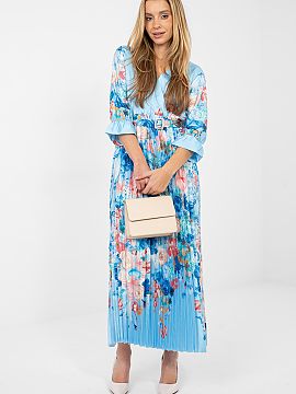 Daydress Italy Moda  The summer maxi dress with a flared silhouette is a combination of lightness, elegance, and feminine style. The model enchants with a floral