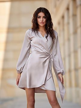 Formal dress Roco Fashion  Dress made of soft, satin material, which gives it an exceptionally elegant character. The wrap style with a tie at the waist beautifully em