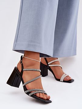 Heeled sandals Step in style  Women\'s sandals with a stable pillar-shaped heel are the perfect choice for women who value comfort and a stylish look. The model is distin