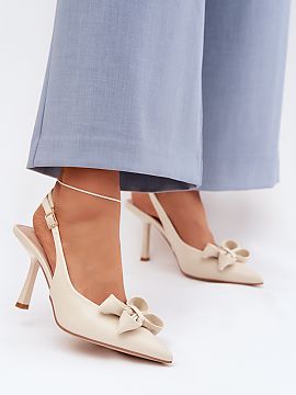 Heeled sandals Step in style  Women\'s sandals made of eco-leather are a model created with elegant female stylizations in mind. Pointed toes decorated with a bow give th