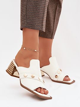 Slippers Step in style  Women\'s leather sandals are an elegant proposition for feminine stylizations. The model set on a stable column heel ensures comfort while w