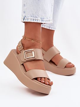 Wedges Step in style  Women\'s sandals made of eco leather are a comfortable and stylish option for warmer days. The model is set on a stable wedge with a platfor