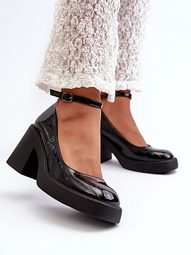 Heeled pumps Step in style  Unique pumps made of eco-leather. Fastened with an adjustable buckle strap, ensuring a perfect fit to the foot. Set on a chunky, higher bloc