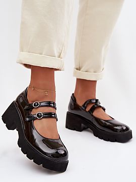 Heeled loafers Step in style  Women\'s patent leather shoes are a fashionable proposal with a strong character. The model, set on a massive heel and platform, provides st