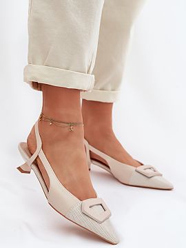 Heeled sandals Step in style  Women\'s low-heeled sandals are an elegant proposal, perfect for special occasions. The model has pointed, covered toes, which give it a cla