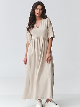day dress Makadamia  Stylish maxi dress is the perfect combination of comfort and timeless elegance. Its loose, casual cut beautifully fits the silhouette, provi