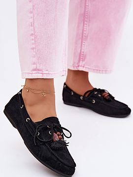 Moccasins Step in style  Women\'s loafers made of eco suede are a stylish proposition for everyday wear. The front of the shoe is adorned with beads, a fringe, and a
