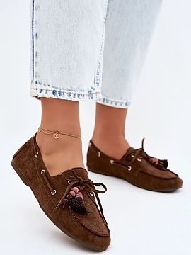 Moccasins Step in style  Women\'s moccasins made of eco suede are a stylish proposition for everyday wear. The front of the shoe is adorned with beads, tassels, and 