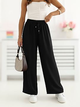 Women trousers Factory Price  Wide leg women\'s trousers are a comfortable and stylish option for everyday wear. The model with wide, long legs beautifully shapes the sil
