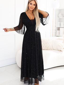 Long dress Numoco  This black maxi plus size dress delights with a subtle shine that beautifully reflects the light with every movement. The wrap top, defined 