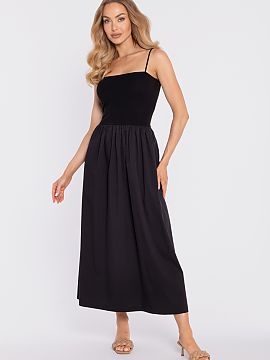Daydress Moe  Elegant maxi dress is a combination of comfort and modern design. The model stands out with a contrasting construction, the fitted top is ma
