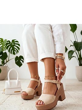 Heel sandals Solea  Elegant and expressive sandals on a massive heel are a proposal for women who like a combination of fashionable design, comfort, and feminin