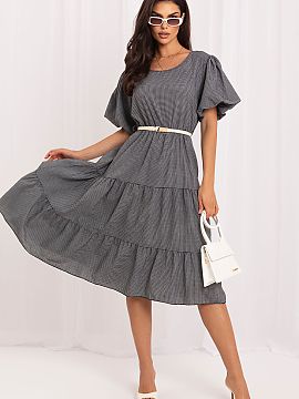 Daydress Italy Moda  The women\'s summer dress with a flared cut is an ideal proposition for everyday stylizations. The classic check pattern gives it a timeless