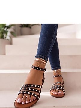 Sandals Solea  Classic flat sandals with decorative jets are the perfect choice for warm days for women who appreciate comfort and universal style. Their t