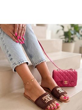 Flip-flops Solea  Classic sandals with an airy pattern and decorative detail are an elegant proposition for summer days. The subtle finish gives the footwear 