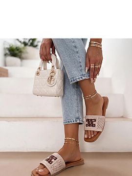 Flip-flops Solea  Classic sandals with a lace pattern and decorative detail are an elegant proposal for summer days. The subtle finish gives the footwear a un