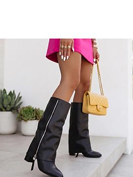 Heel boots Solea  Classic women\'s boots are an elegant model that combines a timeless cut with eye-catching detail. Made of eco-leather, they impress with a 