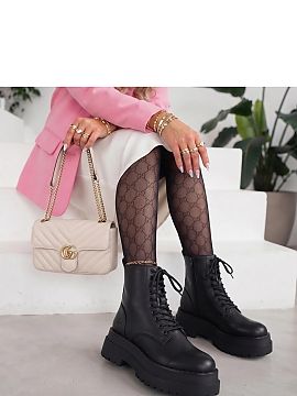 Platform boots Solea  Women\'s platform ankle boots are an eye-catching model that combines a fashionable look with comfort and functionality. Made of eco-leather