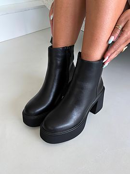 Platform boots Step in style  Women\'s ankle boots made of ecological leather are a stylish proposal for women who like fashionable footwear with a distinctive accent. Th