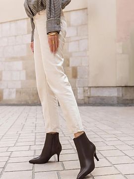 Heel boots Step in style  Elegant high-heeled ankle boots are a stylish proposal for women who like feminine styles with class. The slim heel beautifully emphasizes t